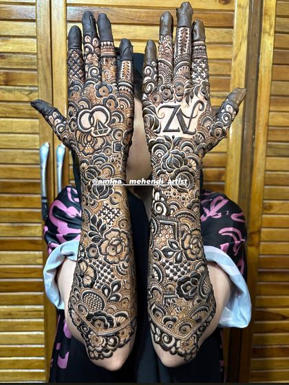 A full view of the engagement design with the 'A' and 'Z' initials and the ring motif.