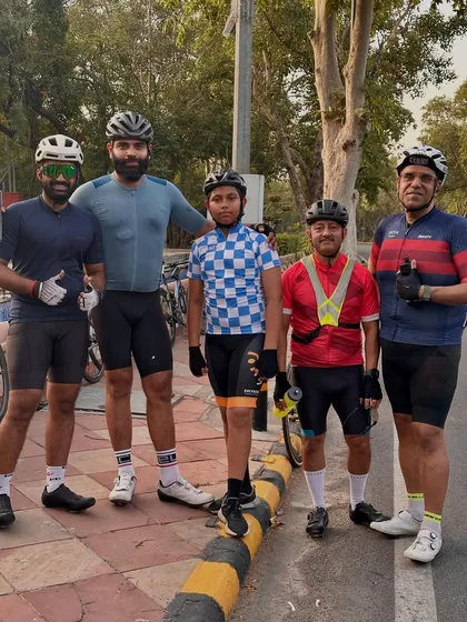 A group of five riders, a mix of veterans and younger members, all part of the DC family.