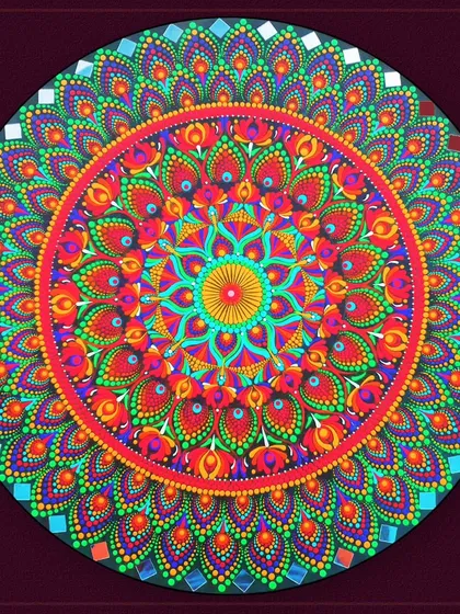 A vibrant, multi-colored dot mandala, showcasing a different technique for creating these intricate circular designs.