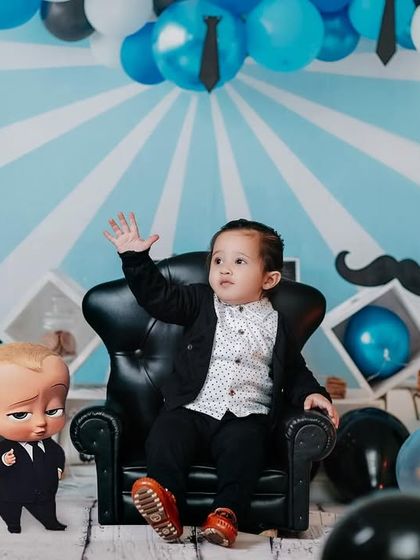 A confident wave from the boss baby in his special themed photoshoot. We love bringing creative ideas to life.