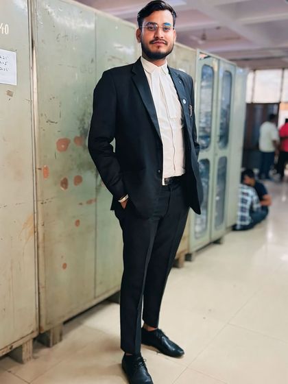 A portrait taken within the court complex. Dressed for battle, I am self-sufficient and ready to take on any legal challenge that comes my way.