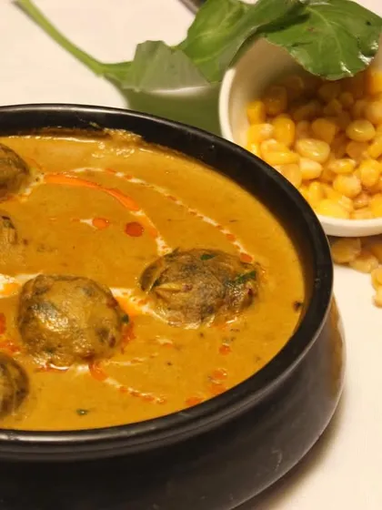 A delightful fusion of corn and spinach balls in a rich and flavorful gravy. Our Corn Palak Kofta is both nutritious and delicious.