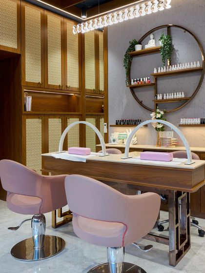 A detailed shot of our chic and modern nail art station. With comfortable seating and professional lighting, it's the perfect setting for creating your dream nails.
