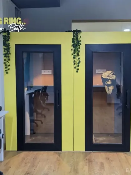 Ring ring! We added these funky yellow phone booths to an open office to provide private, soundproof spaces for calls.