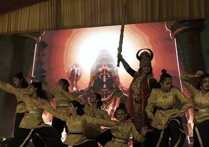 A powerful moment from our grand dance drama production of the 'Ramayan'. This image captures the scale and theatricality of our productions, where we bring epic stories to life with elaborate costumes, dramatic choreography, and a large cast of talented artists.