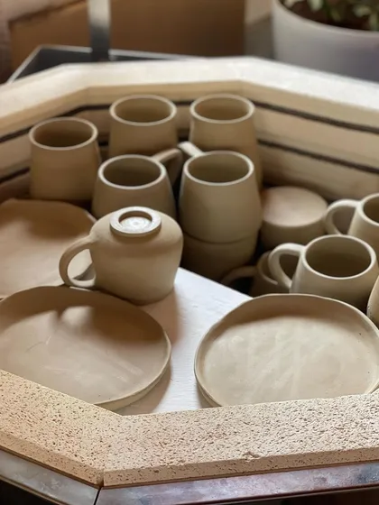 Another view of the kiln loaded with custom tableware. Each firing is a step closer to completing a client's vision.
