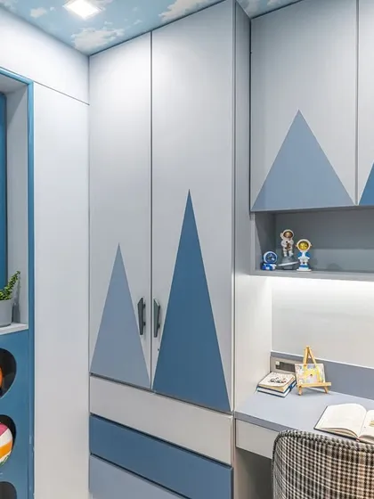 Here you can see how the study desk is built directly into the wardrobe unit, creating a seamless and efficient use of space. The integrated LED lighting under the shelf provides excellent task lighting for homework or creative projects.