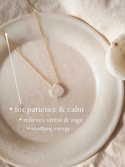 My 'saṅkha' howlite shell pendant, a stone for patience and calm. It has a wonderfully soothing energy that helps relieve stress and rage.