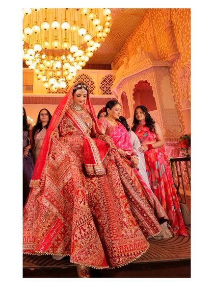 The bride's grand entrance. Her makeup is designed to be captivating, ensuring all eyes are on her as she walks down the aisle.