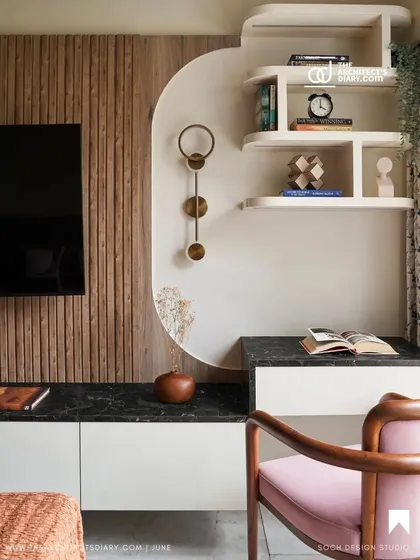 An image from the feature in The Architect's Diary, showcasing a study nook with a curved shelving unit and textured wall.