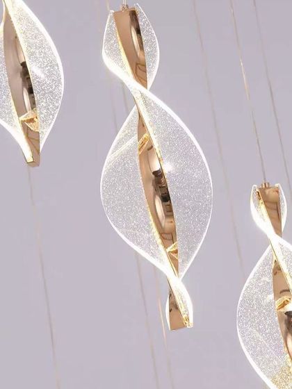 A close-up of the textured acrylic on our spiral pendants. The details create a glittering effect when the light is on.