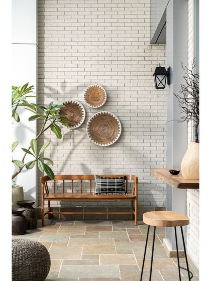 This apartment's standout feature is its 500 sq. ft. deck, 22 feet high, with breathtaking views. This space was one I was most excited to design, knowing it would be the most used area of the home.