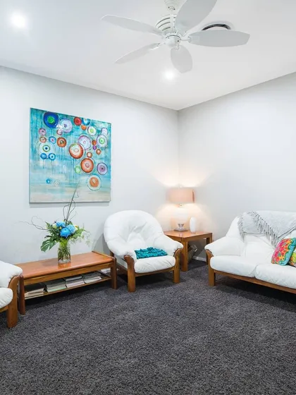 A bright and cheerful abstract canvas with circular patterns. This piece adds a splash of color and energy to a minimalist room.