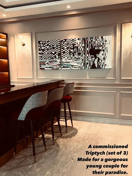 Art should live and breathe in your space. This commissioned triptych, a set of three monochrome paintings, was created for a young couple's paradise, their home bar. It shows how we can collaborate to create a statement piece that perfectly complements your interior design and personal style.