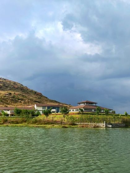 A view of the retreat from across the lake. This perspective highlights our connection to the water and the expansive, peaceful environment we offer.