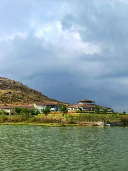 A view of the retreat from across the lake. This perspective highlights our connection to the water and the expansive, peaceful environment we offer.