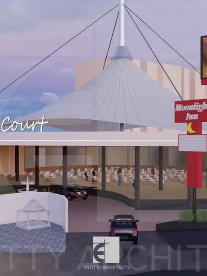 This perspective highlights the food court's branding and night-time appeal. The design includes prominent signage and lighting to attract travelers from the highway, ensuring visibility and commercial viability.