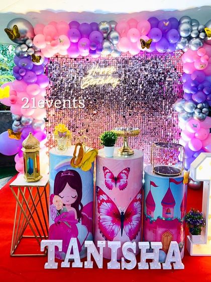 Another shot of the butterfly theme with the sequin backdrop, a very popular choice.
