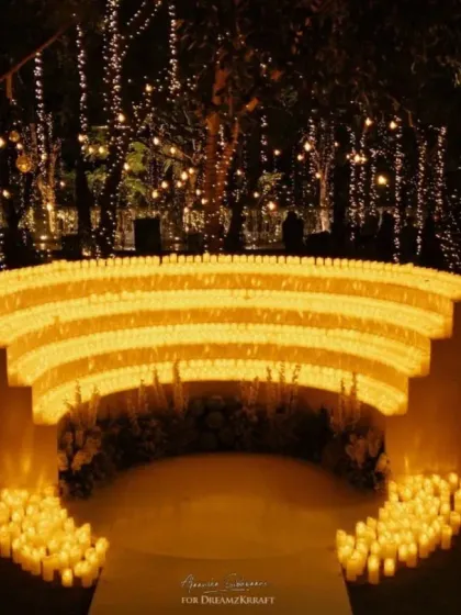 The magic is in the details. For this welcome dinner, I used thousands of candles to sculpt the space, creating an immersive, warm, and enchanting entryway that set a magical tone for the entire wedding.