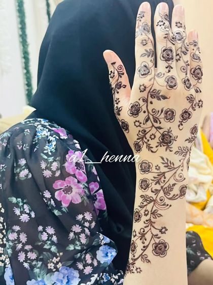 A delicate floral vine that extends up the arm, created using my own organic cones.