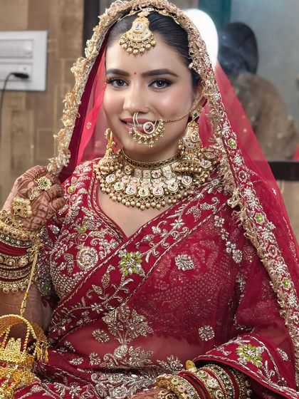 This bride looks absolutely radiant. The makeup enhances her natural beauty, giving her a confident and happy glow.