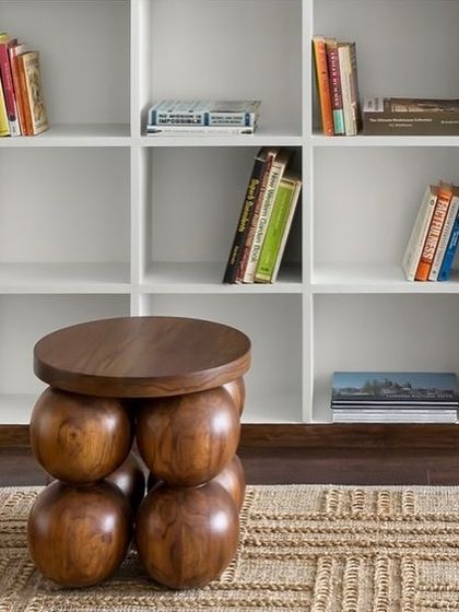 A detail of the custom-made wooden stool in the West Coast Residence, showcasing its playful, sculptural form.