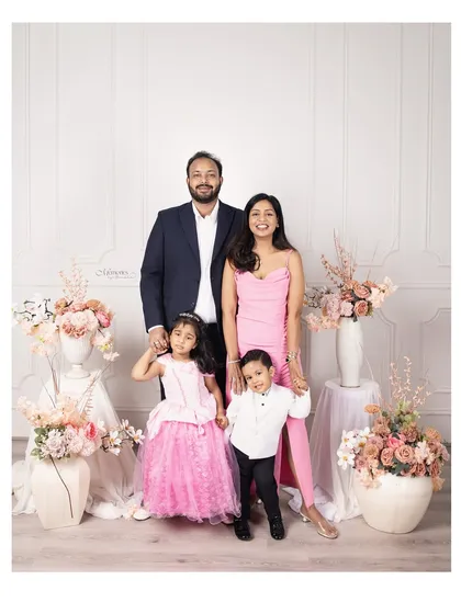 A family portrait is more than just a picture; it's a memory of togetherness. I love creating beautifully styled scenes, like this floral setup, to frame your family's love in an elegant and timeless way.