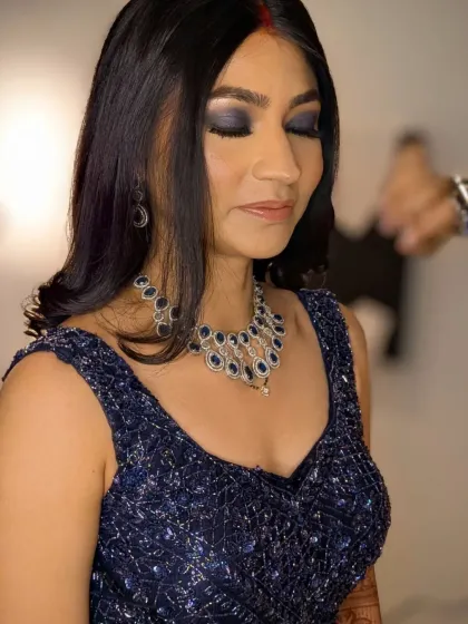 A close up showing the detail of the blue smokey eyeshadow. Blending is key to a look like this, ensuring there are no harsh lines, just a seamless gradient of color.