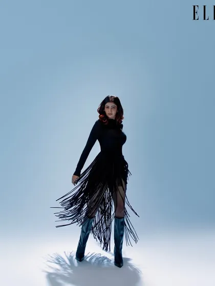 For this look in Elle India, I styled the model's hair with soft waves and a touch of volume. This complements the movement of the fringed dress, creating a dynamic and eye-catching image.