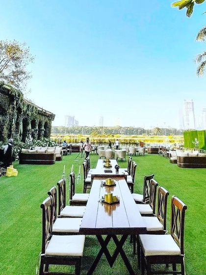 I handle large-scale outdoor events as well. For this lawn party, I installed artificial turf and arranged seating for a large number of guests. My services can cover everything from the ground up to make your outdoor venue ready for any celebration.