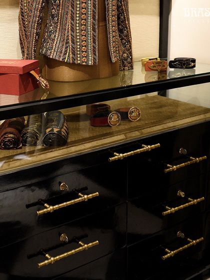 The Bamboo T-knobs used on a men's accessory display, proving their suitability for a range of retail environments.