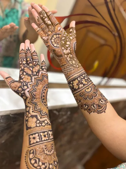 A final look at this stunning full-arm mehandi, a testament to patience and skill.