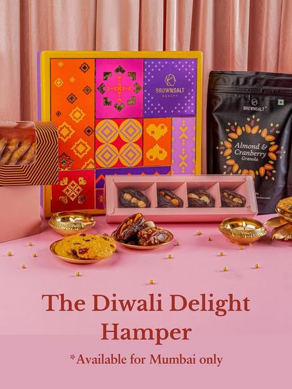 Our Diwali Delight Hamper is a thoughtful collection perfect for office gifting. This option, available for Mumbai delivery, includes assorted cookies and our popular stuffed dates, making it a sweet and memorable gesture.