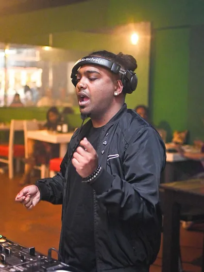 On the mic, bringing the heat. Sometimes you gotta interact with the crowd to take the energy to the next level. YEET!