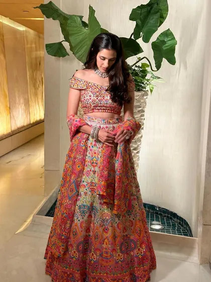 Another angle of the colorful Abu Jani Sandeep Khosla lehenga, showing its beautiful silhouette and how the colors blend together.