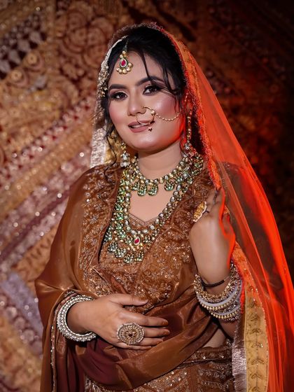 A stunning bridal portrait created by one of my students. The soft focus and warm lighting enhance the romantic feel of the makeup, a technique we discuss in our portfolio classes.