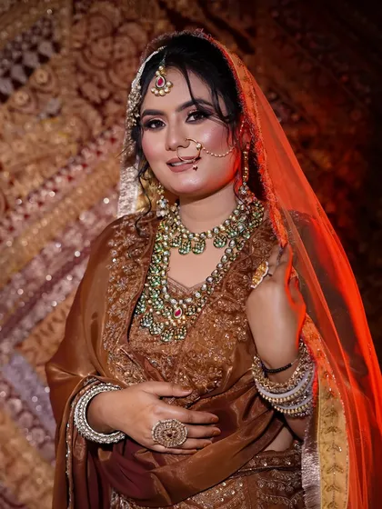 A stunning bridal portrait created by one of my students. The soft focus and warm lighting enhance the romantic feel of the makeup, a technique we discuss in our portfolio classes.