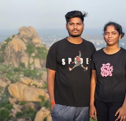 A couple enjoying a quiet moment at the top of Kunti Betta.
