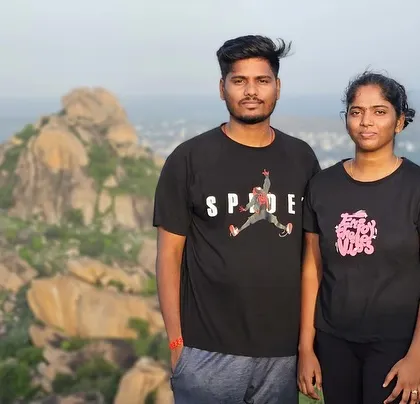 A couple enjoying a quiet moment at the top of Kunti Betta.