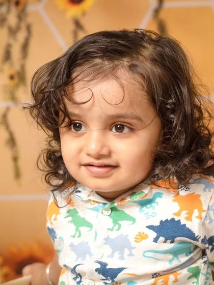 A collection of candid and playful moments from a sunflower-themed session, showing a range of expressions from curious to joyful.