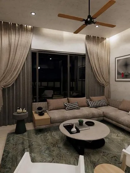 A cozy family room concept with a large L-shaped sofa, textured walls, and soft curtains, designed for comfort and relaxation.