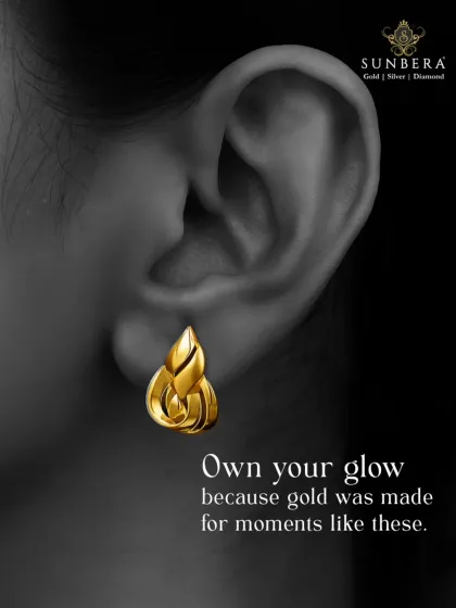 A model wears our elegantly crafted gold knot earrings. This image captures the beautiful sheen of the gold and the modern, sculptural design, illustrating how our pieces can elevate any look.