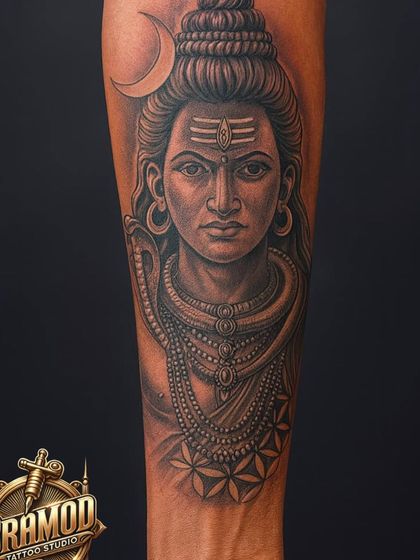 A close-up of a hyper-detailed Mahadev portrait on the forearm. The shading is smooth and the details in the jewelry and the crescent moon are crystal clear, showing the quality of my work.