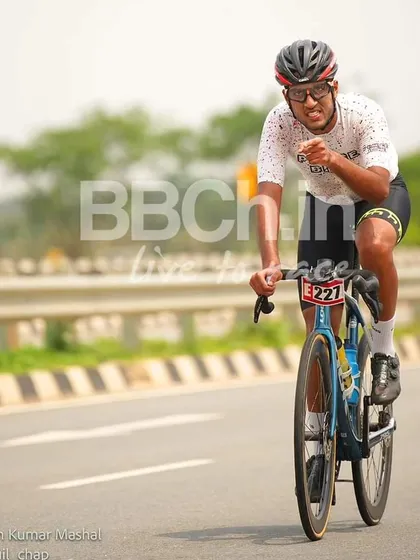 An elite rider, showing the strain and effort of a long and hard race.