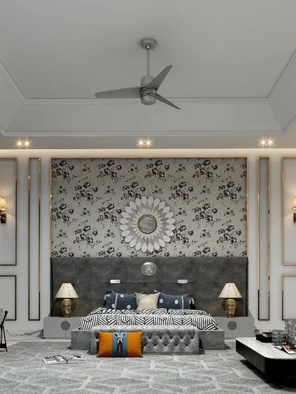 A wider view of the bedroom, showing the full extent of the feature wall and the spacious layout. The design includes a comfortable seating area, making the room a true master suite.