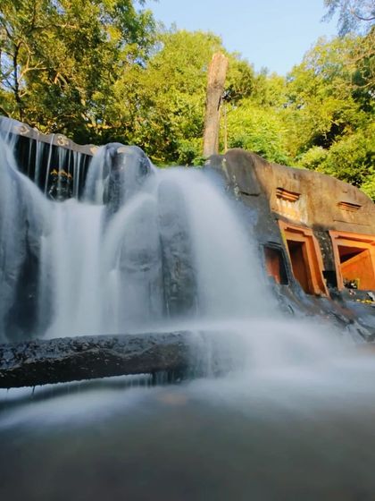 A long-exposure shot of the waterfall at Kalathgiri, creating a beautiful, flowing water effect.