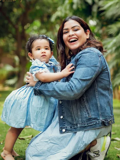 The pure happiness of a mother and daughter playing together in the park. These are the real, beautiful moments.