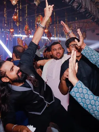The energy is infectious when everyone is dancing together. I make it a point to leave the bar and join the celebration on the dance floor, leading the charge.