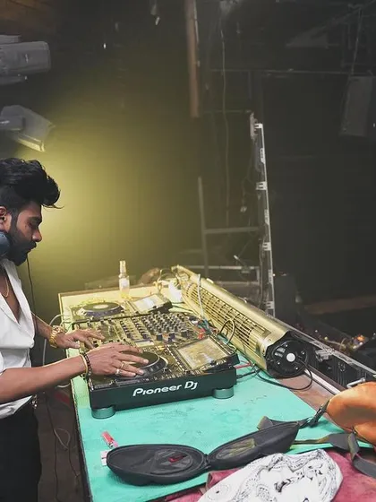 A side view of me at the console at Freq Club.