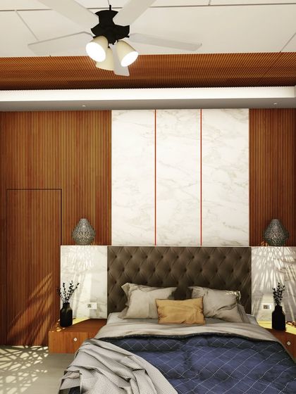 This master bedroom design combines the warmth of vertical wood paneling with the cool elegance of white marble-look slabs. The tufted headboard and floating nightstands add a touch of modern luxury.